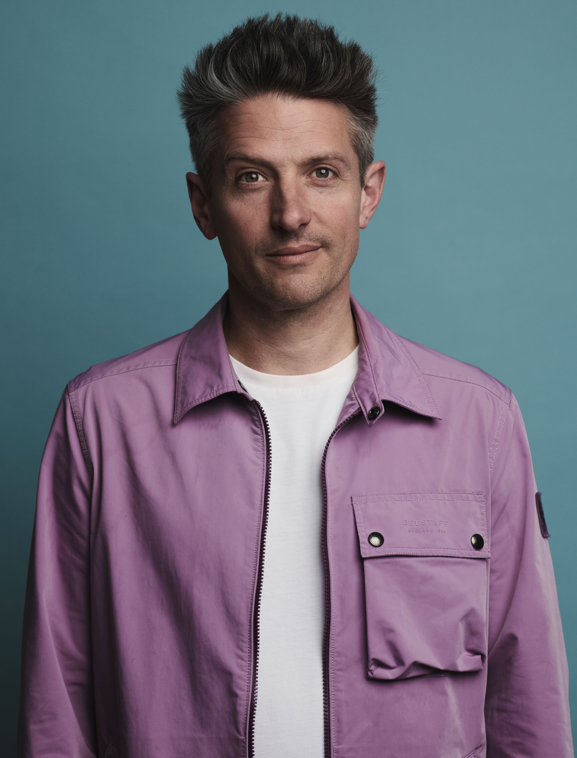 Stuart Goldsmith headshot – pink jacket – credit Matt Crockett